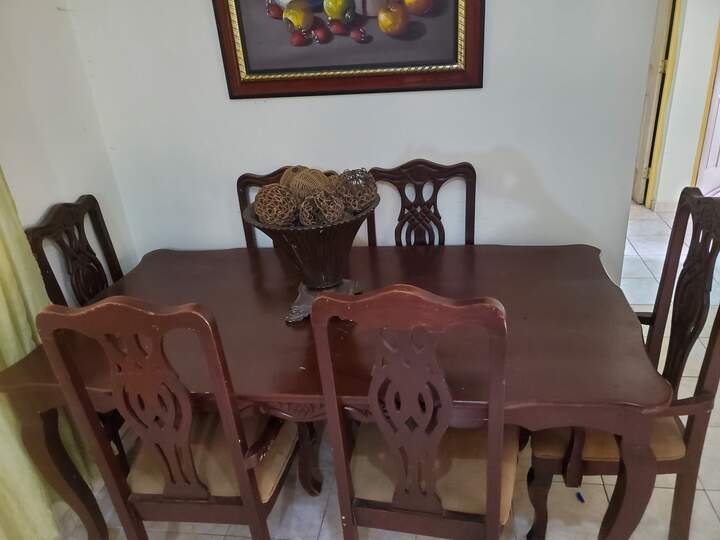 Comedor de caoba elegante en buen estado